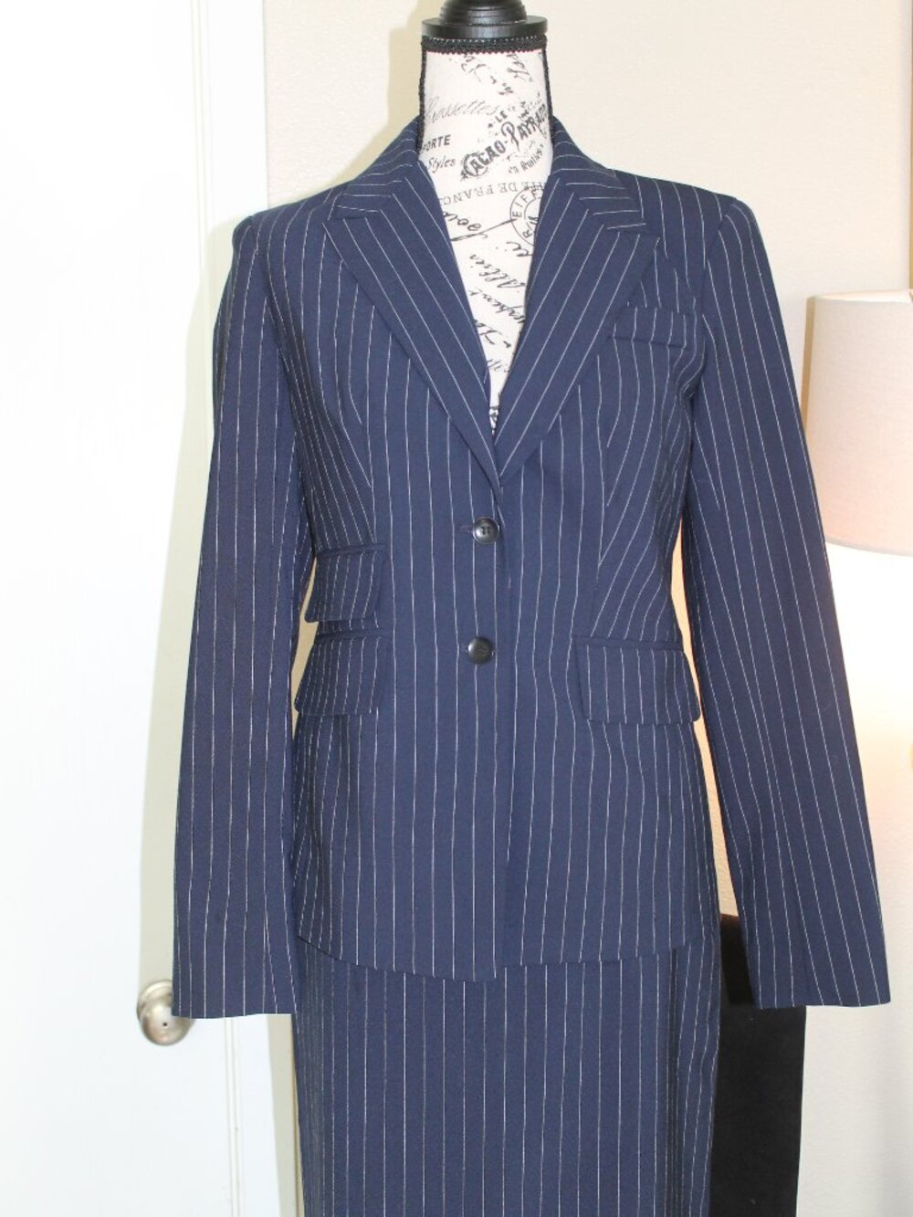 Classic pin-striped business skirt-suit.